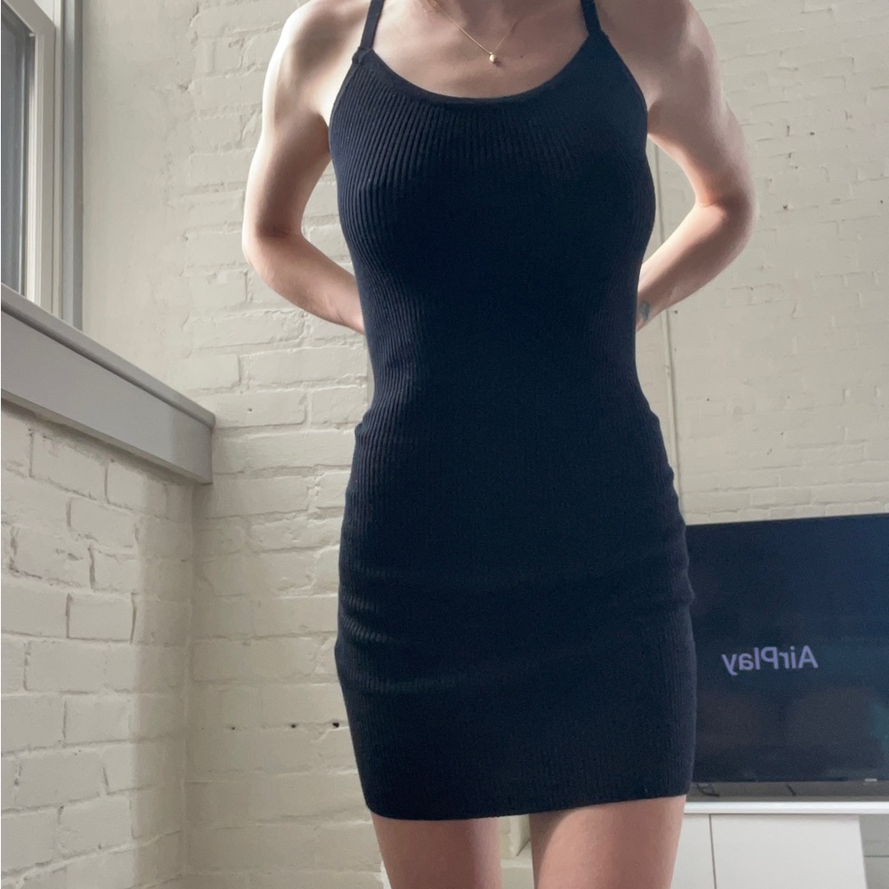 Black bodycon lace up back ribbed dress. Women’s size small.